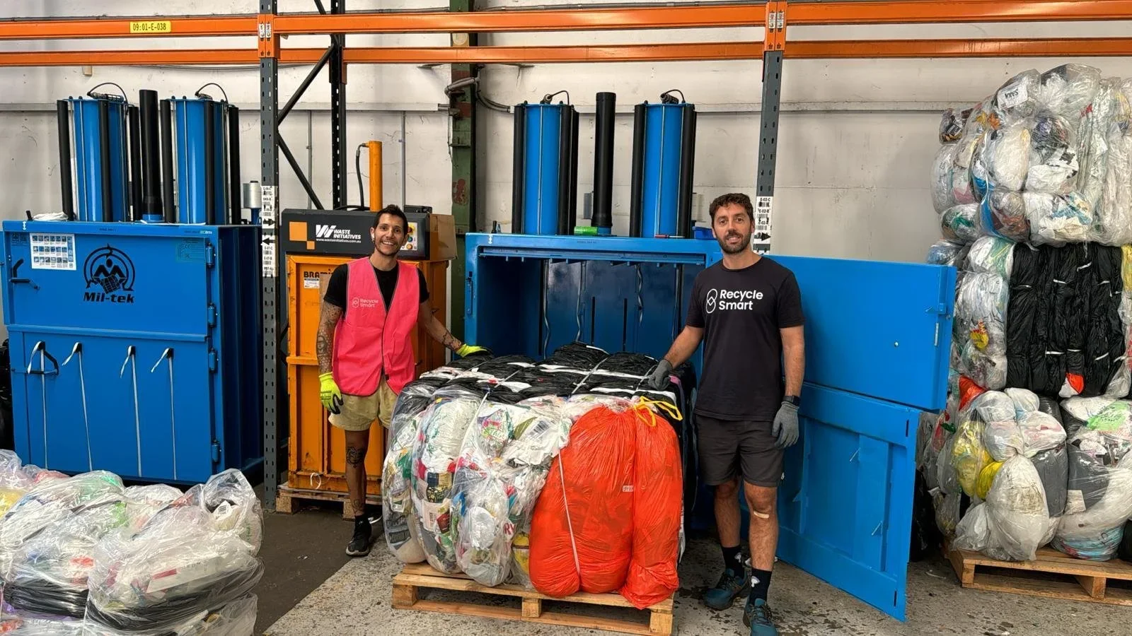 ReSmart team with baled soft plastics at a recycling partner (watch on YouTube)