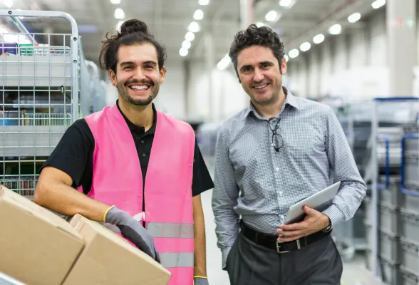 Two ReSmart team members in pink vests